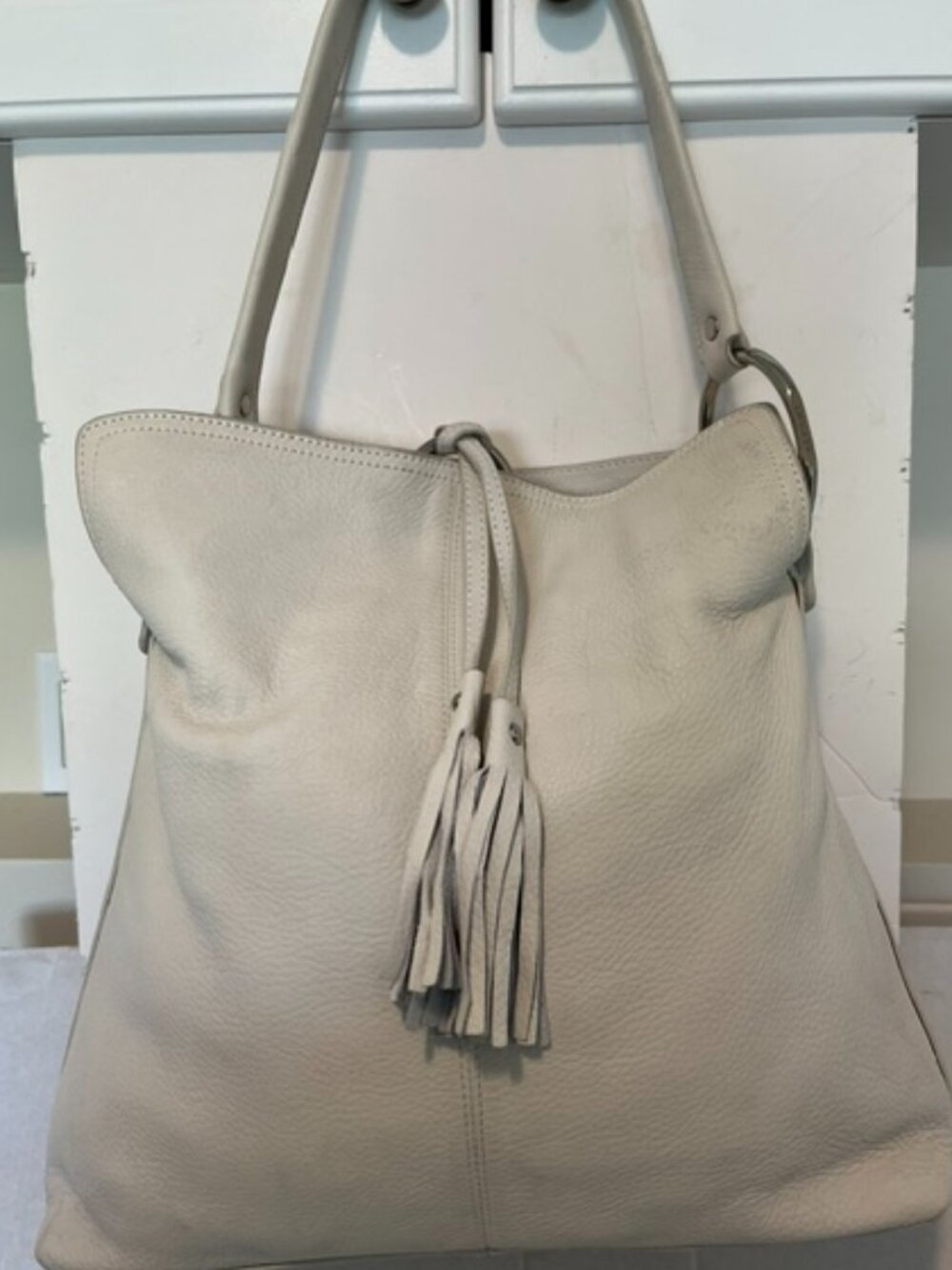 Alfani white leather hobo bag.